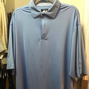Foot joy blue polo. Barely worn, like new.